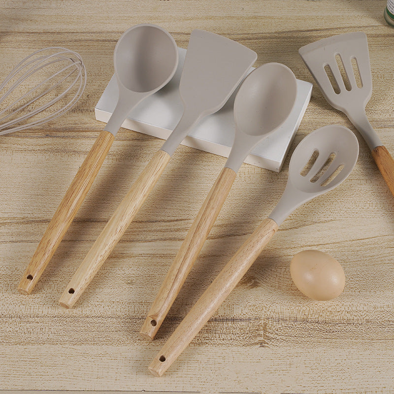 Cross-border 12-piece set of wooden handle silicone cutlery cooking spoon shovel spot cutlery set wholesale factory non-stick pot set